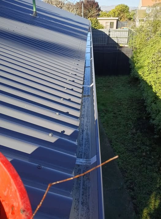 Spotless gutter after cleaning — the standard behind the no-surprises price